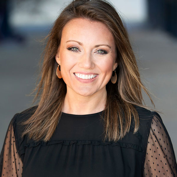DrMillsNew Woman with Red Hair Smiling Indoors